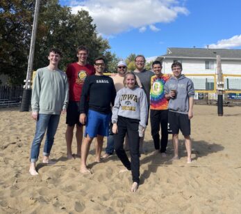 Team photo while playing sand volleyball!